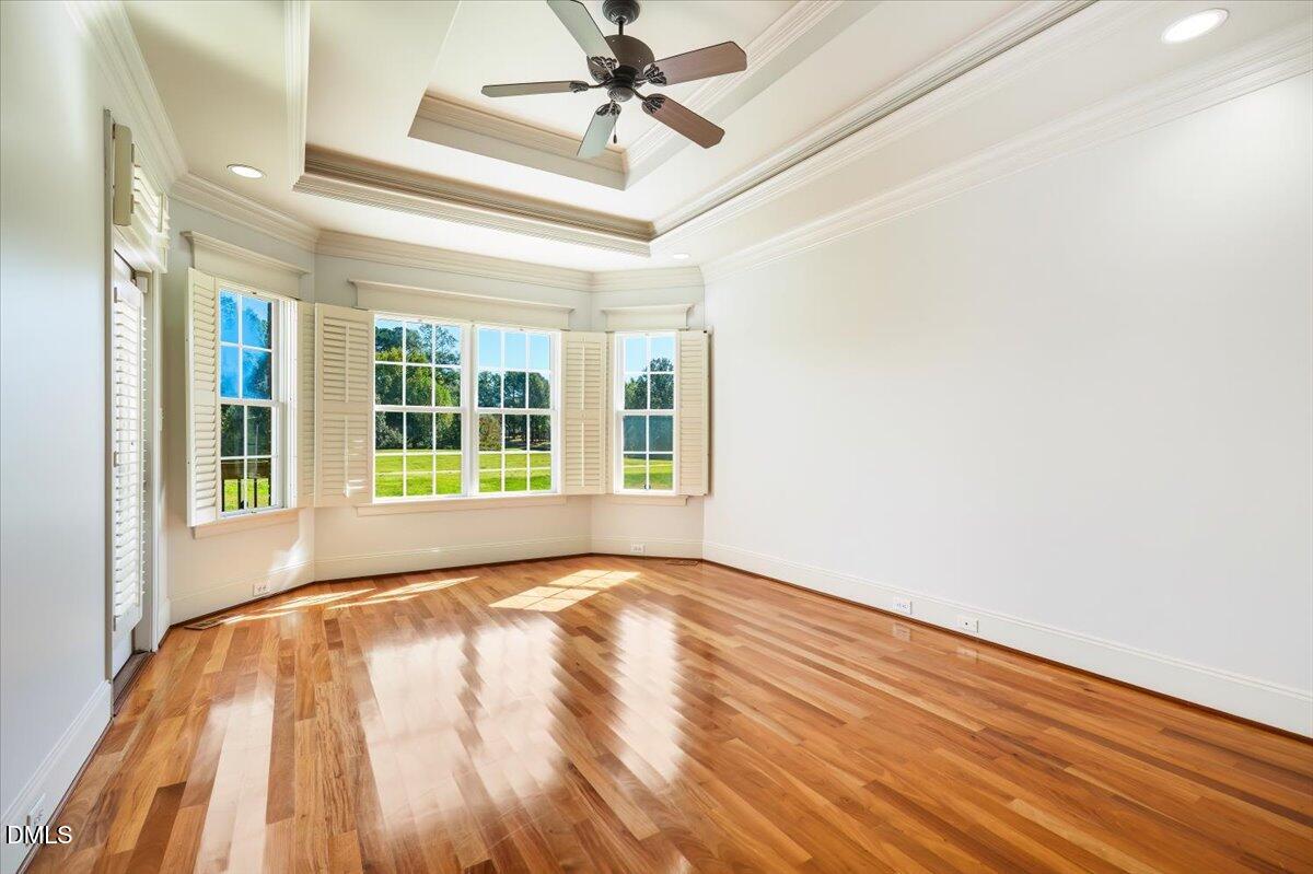 324 Waterville Street Raleigh, NC 27603 - Photo 19 of 82 a view of room with window and wooden floor