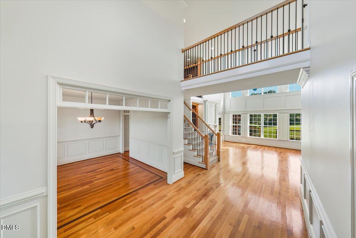 324 Waterville Street Raleigh, NC 27603 - Photo 22 of 82 wooden floor in an empty room with a window