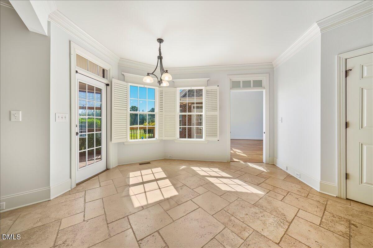 324 Waterville Street Raleigh, NC 27603 - Photo 29 of 82 a view of an empty room with windows