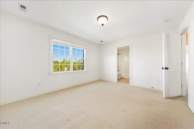 a view of a room with wooden walls