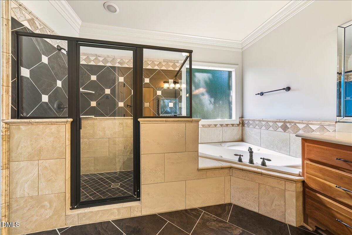 324 Waterville Street Raleigh, NC 27603 - Photo 37 of 82 a bathroom with a sink and a large mirror