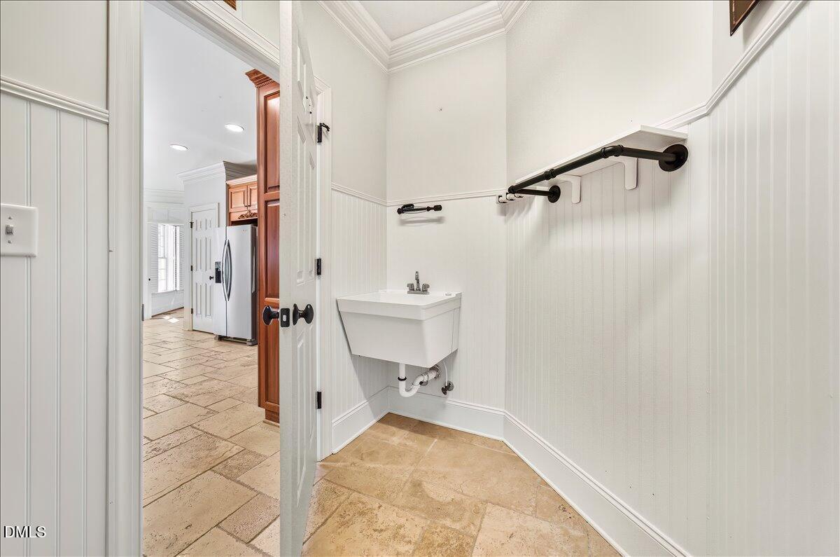 324 Waterville Street Raleigh, NC 27603 - Photo 42 of 82 a bathroom with a sink a toilet and shower
