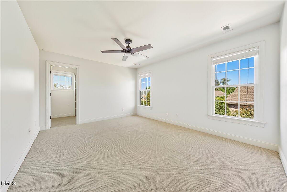 324 Waterville Street Raleigh, NC 27603 - Photo 43 of 82 an empty room with windows and closet