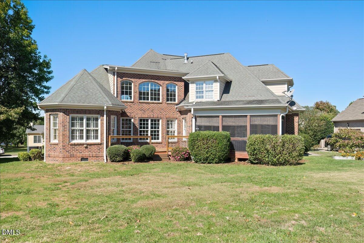324 Waterville Street Raleigh, NC 27603 - Photo 56 of 82 a front view of a house with garden