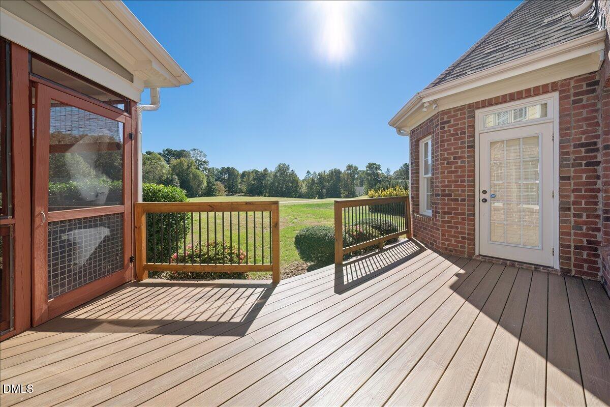 324 Waterville Street Raleigh, NC 27603 - Photo 57 of 82 a view of balcony with wooden floor and fence
