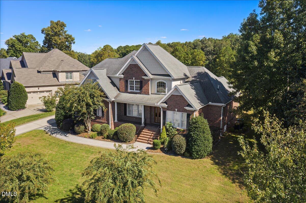 324 Waterville Street Raleigh, NC 27603 - Photo 61 of 82 a view of a house with a yard