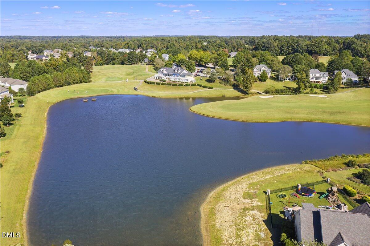 324 Waterville Street Raleigh, NC 27603 - Photo 69 of 82 a view of a swimming pool with a lake view