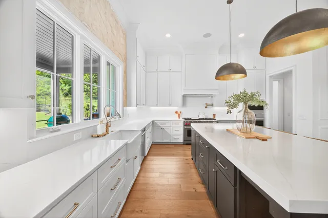 a bathroom with a sink a vanity and a mirror
