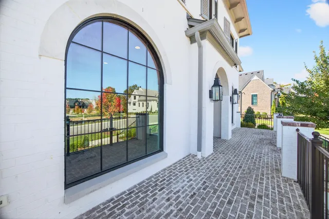 a living room with furniture a rug and a fireplace