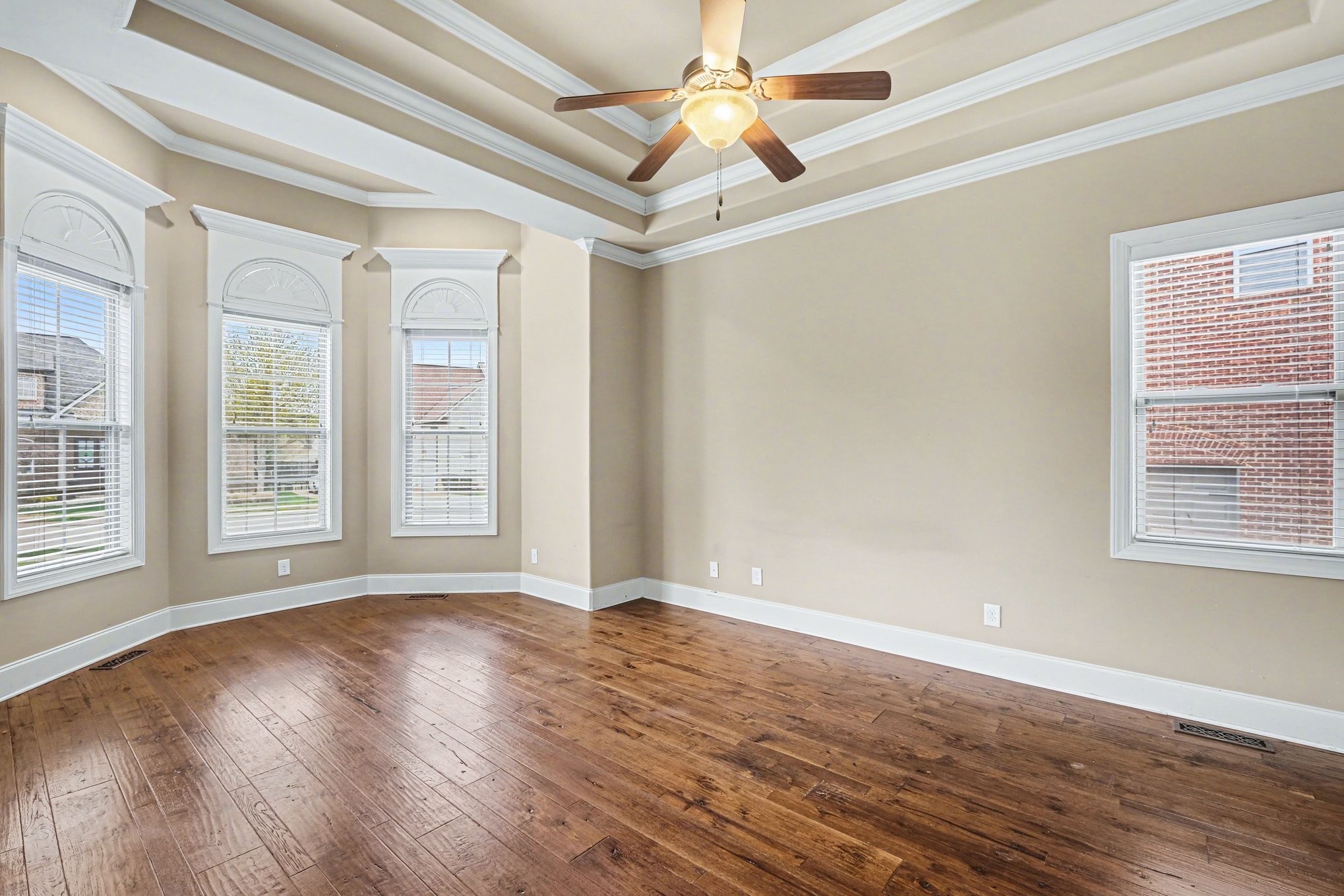 1017 Alice Springs Circle Spring Hill, TN 37174 - Photo 17 of 35 a view of an empty room with wooden floor and a window