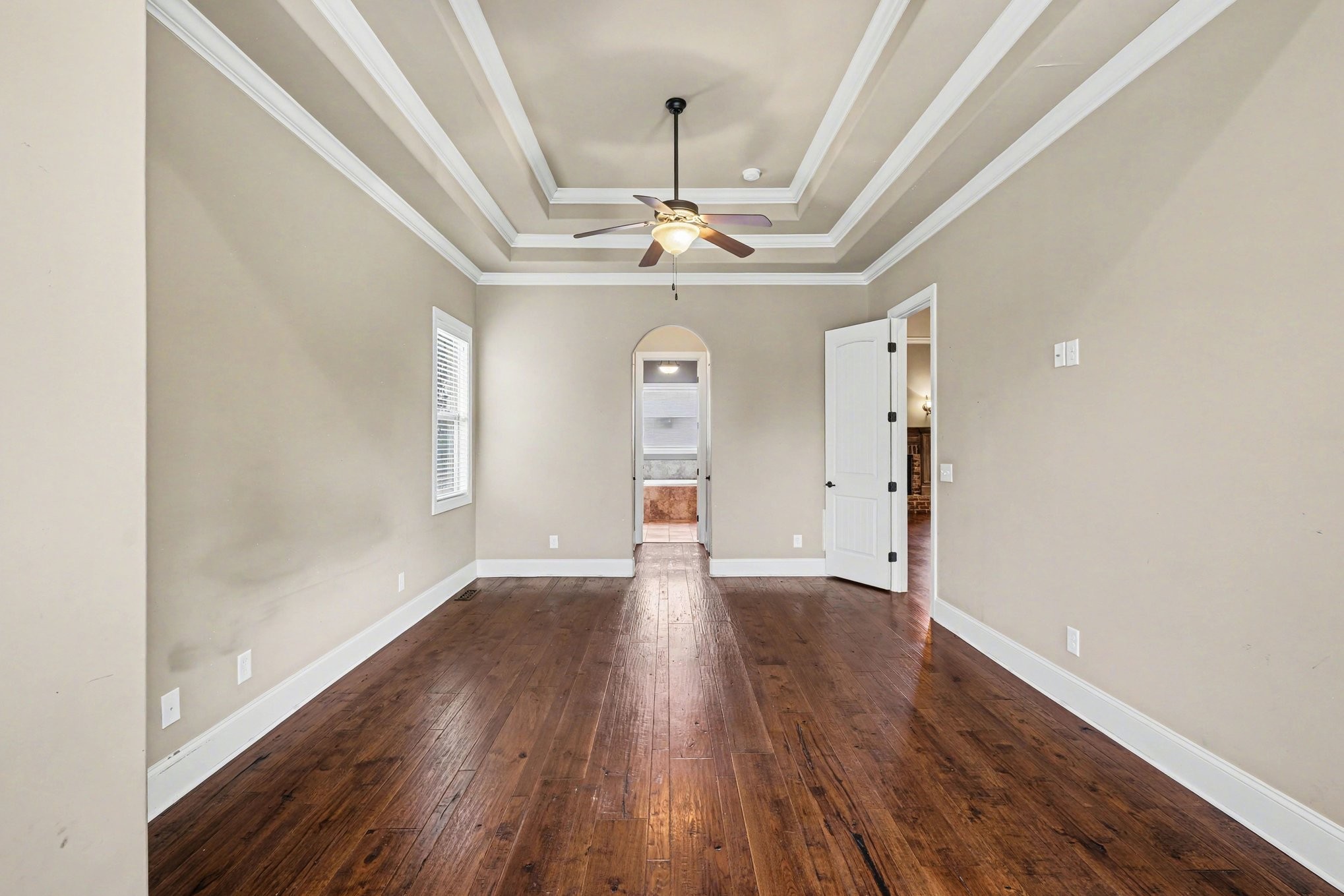1017 Alice Springs Circle Spring Hill, TN 37174 - Photo 18 of 35 wooden floor in an empty room with a window