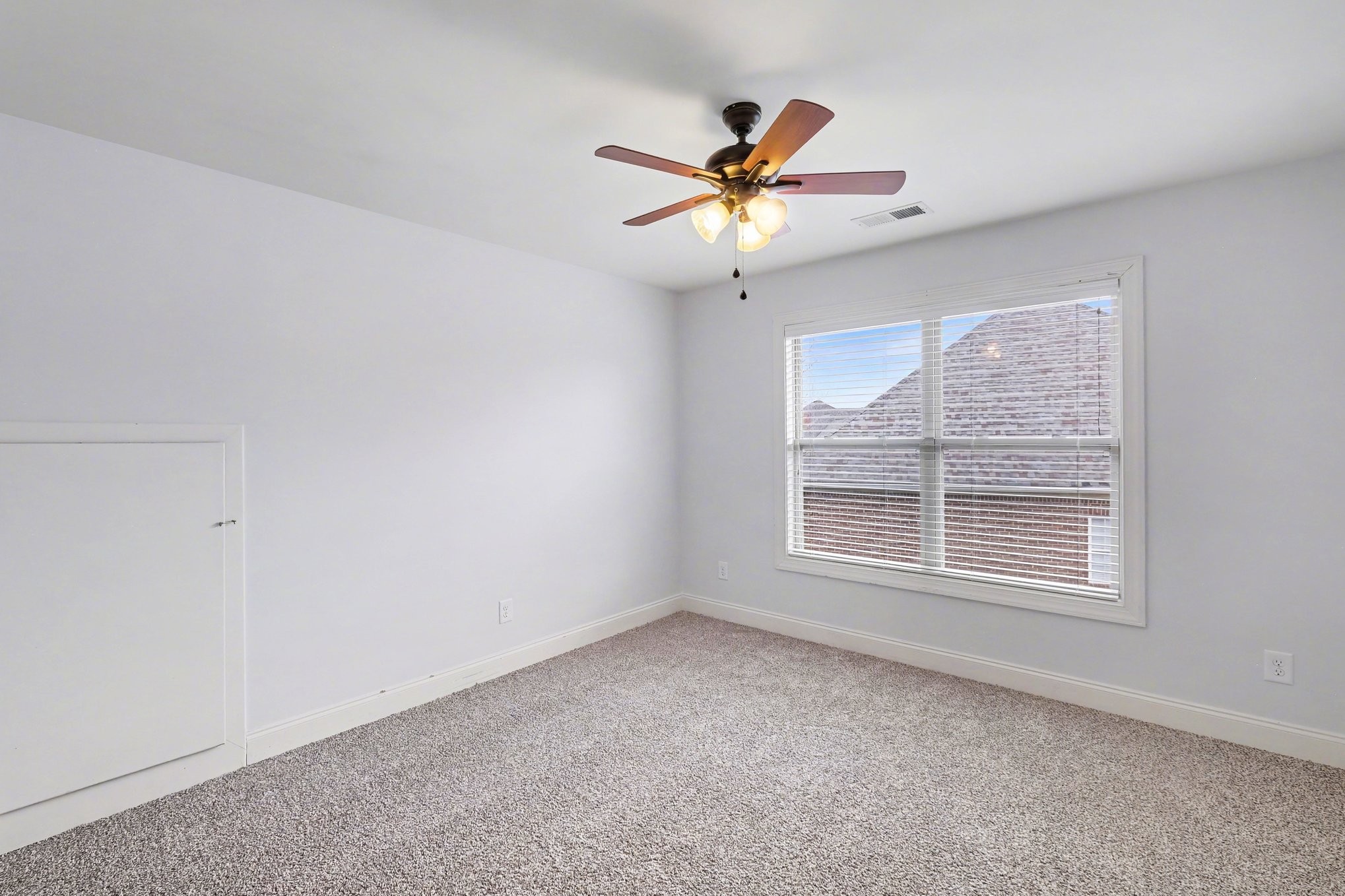 1017 Alice Springs Circle Spring Hill, TN 37174 - Photo 28 of 35 a view of an empty room with a window