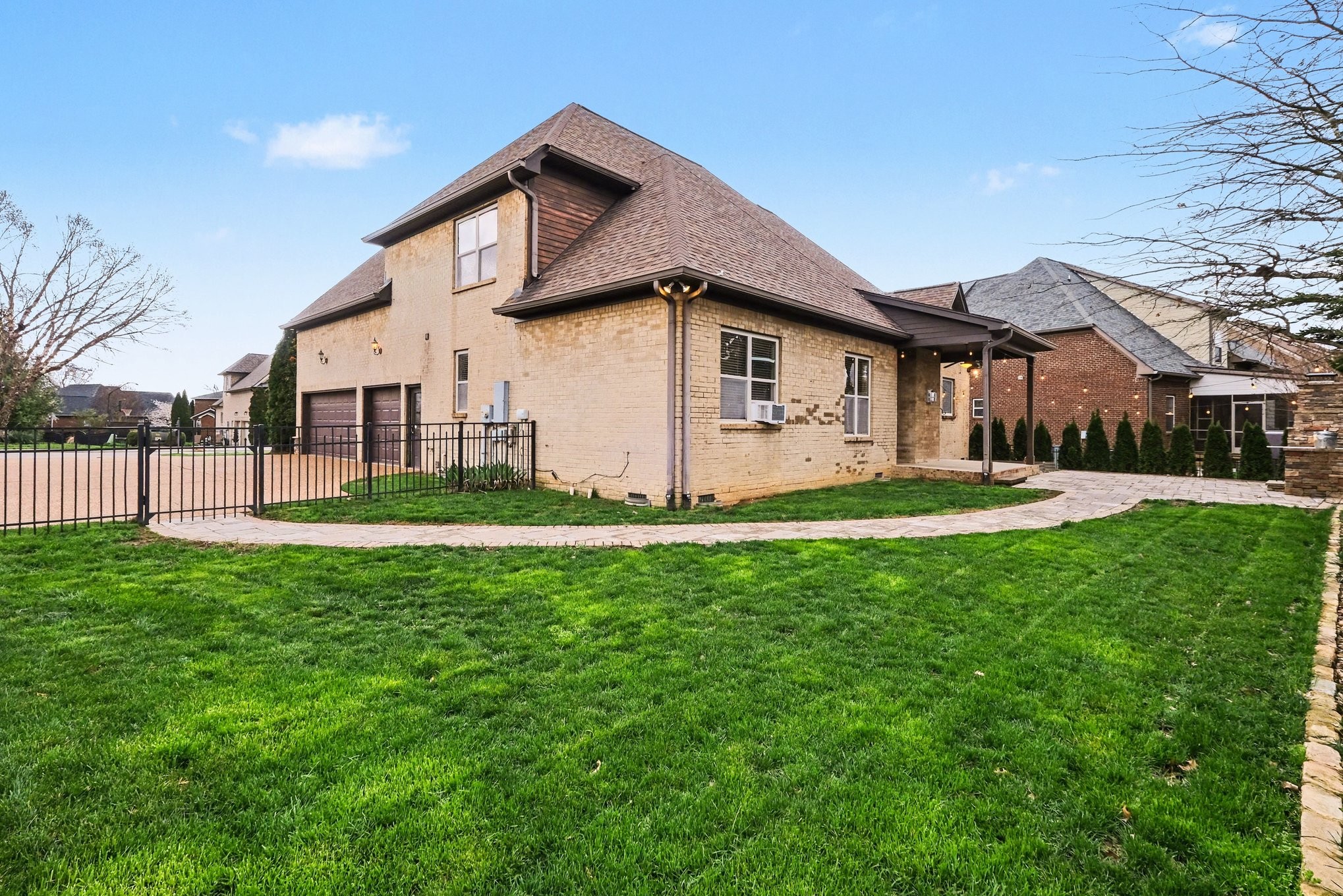 1017 Alice Springs Circle Spring Hill, TN 37174 - Photo 35 of 35 a front view of a house with a yard