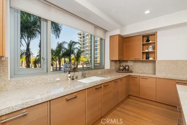 a outdoor living space with furniture and a floor to ceiling window