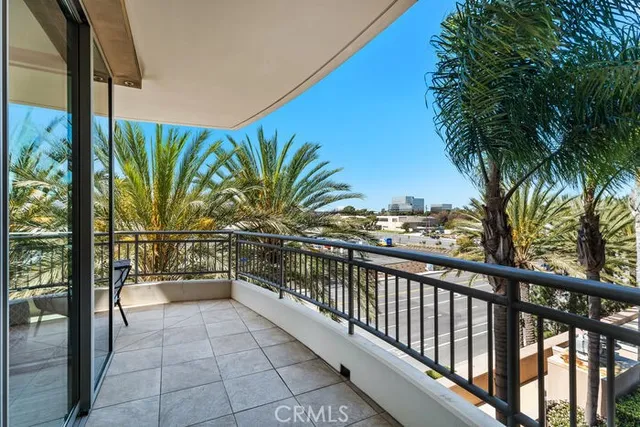 a view of a balcony with chairs