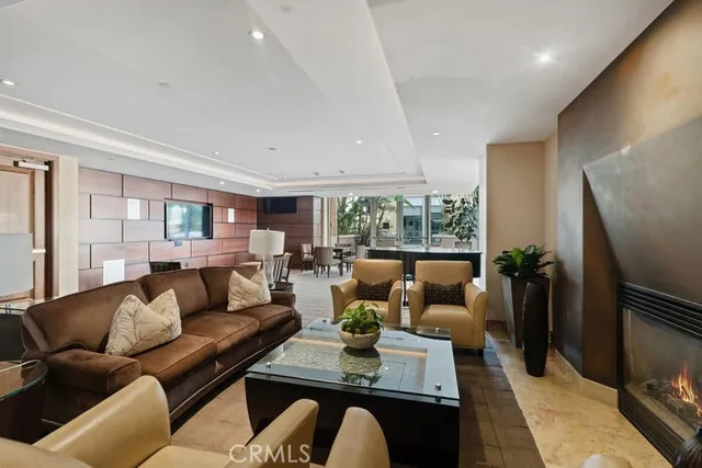 a group of people sitting in living room