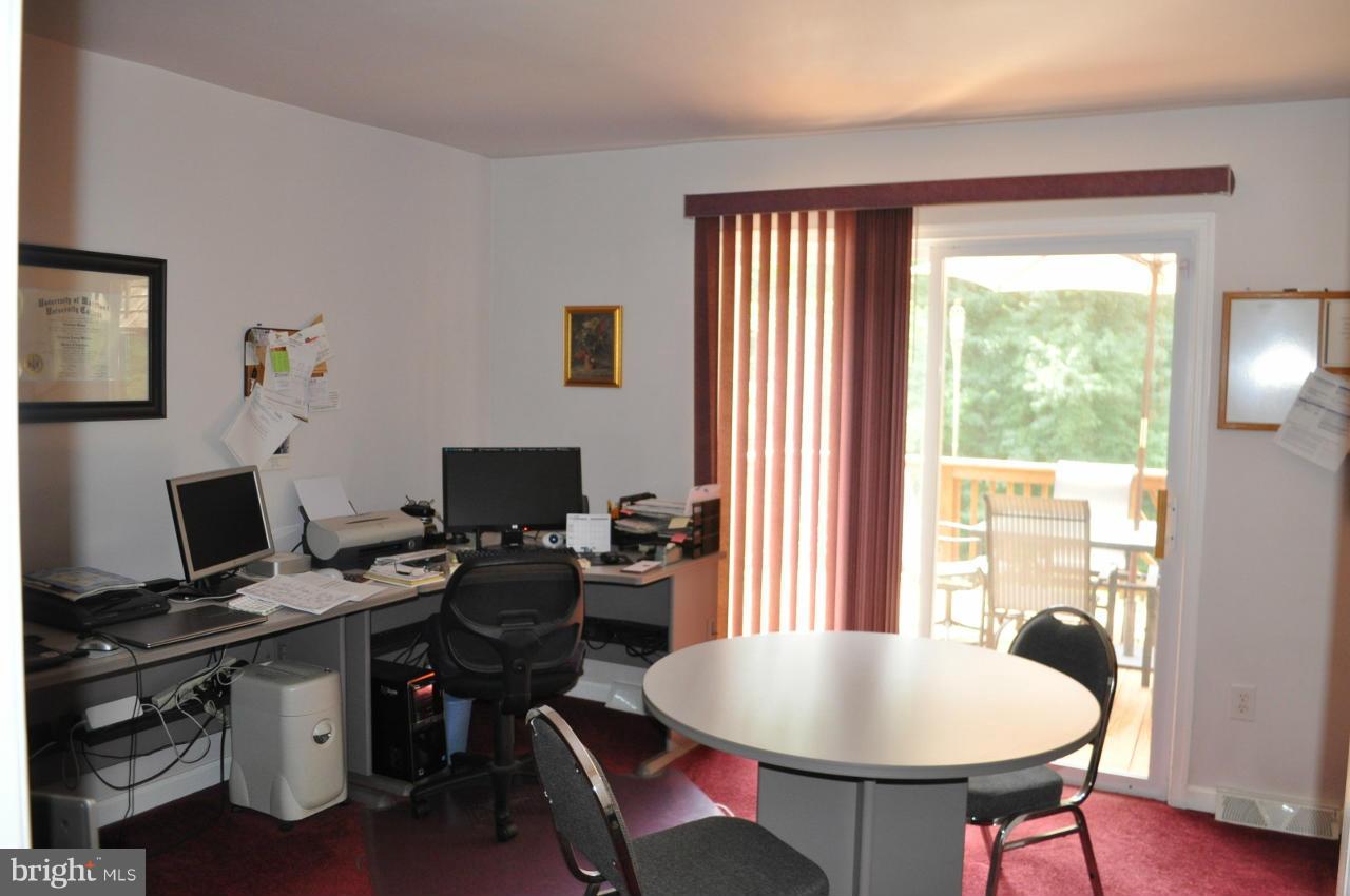 2531 Plum Point Road Huntingtown, MD 20639 - Photo 10 of 30 a workspace with furniture and a window