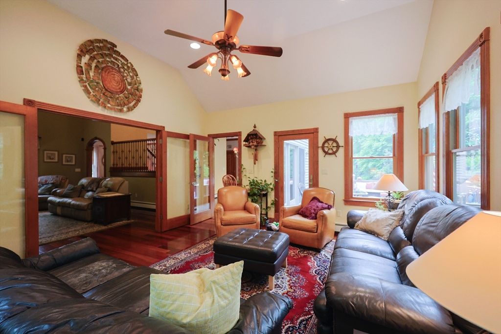70 Azalea Way Hanson, MA 02341 - Photo 15 of 42 a living room with furniture and a large window
