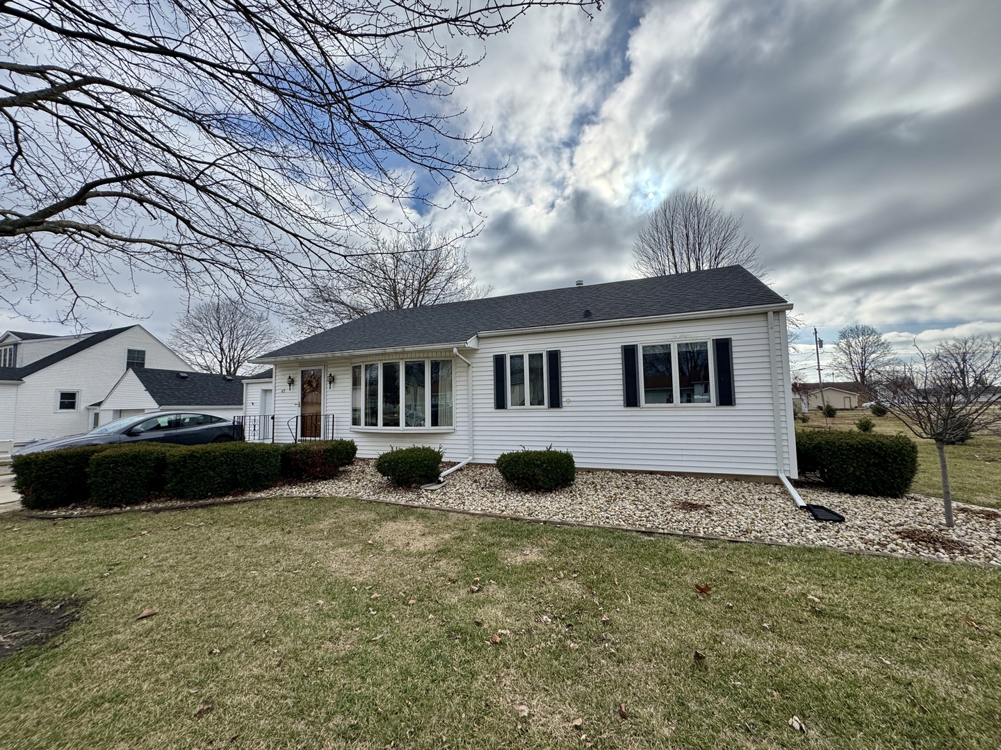 113 West 3rd Street Wyanet, IL 61379 - Photo 2 of 31 a view of a house with a yard