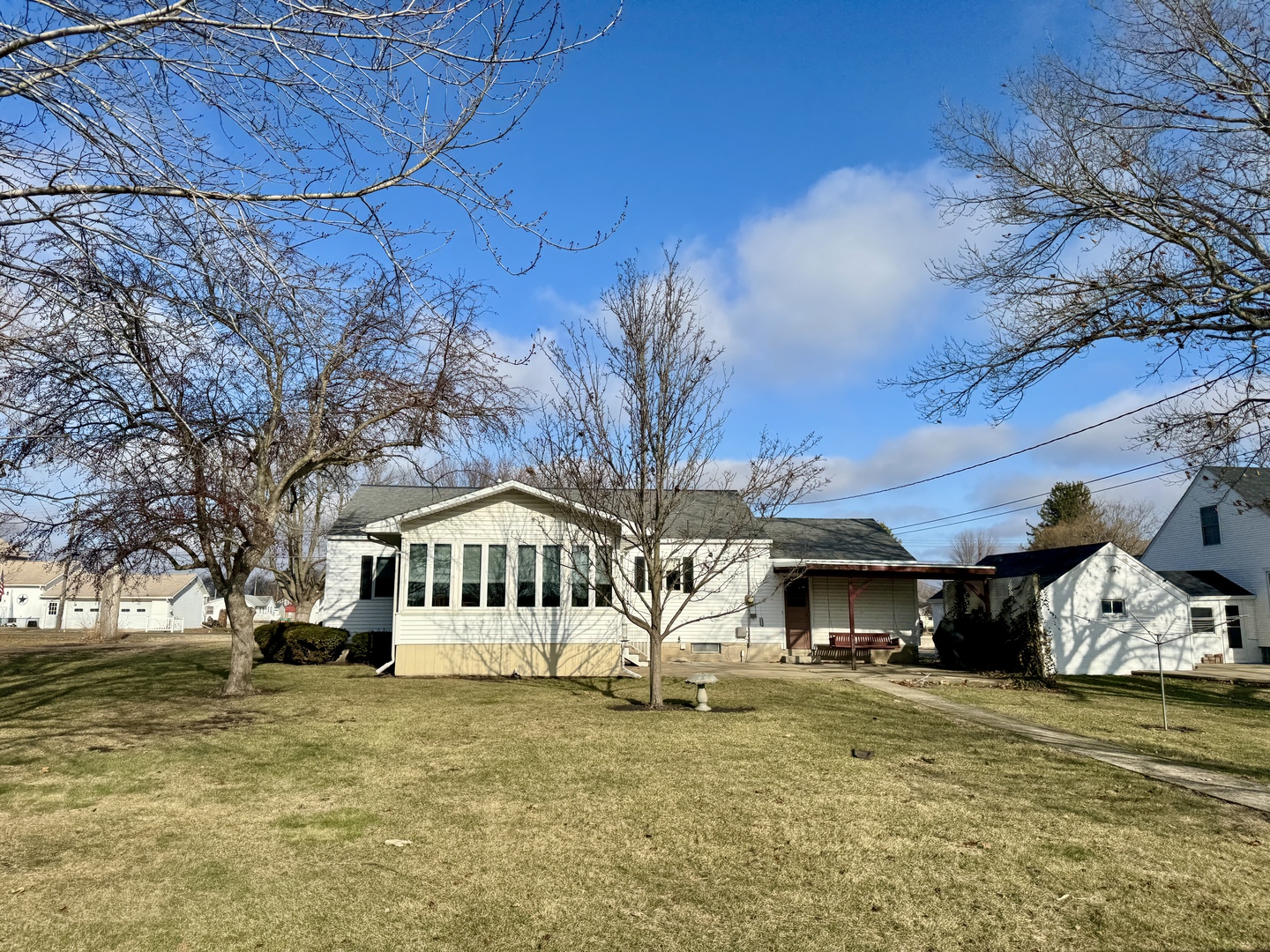 113 West 3rd Street Wyanet, IL 61379 - Photo 30 of 31 a view of a house with a yard
