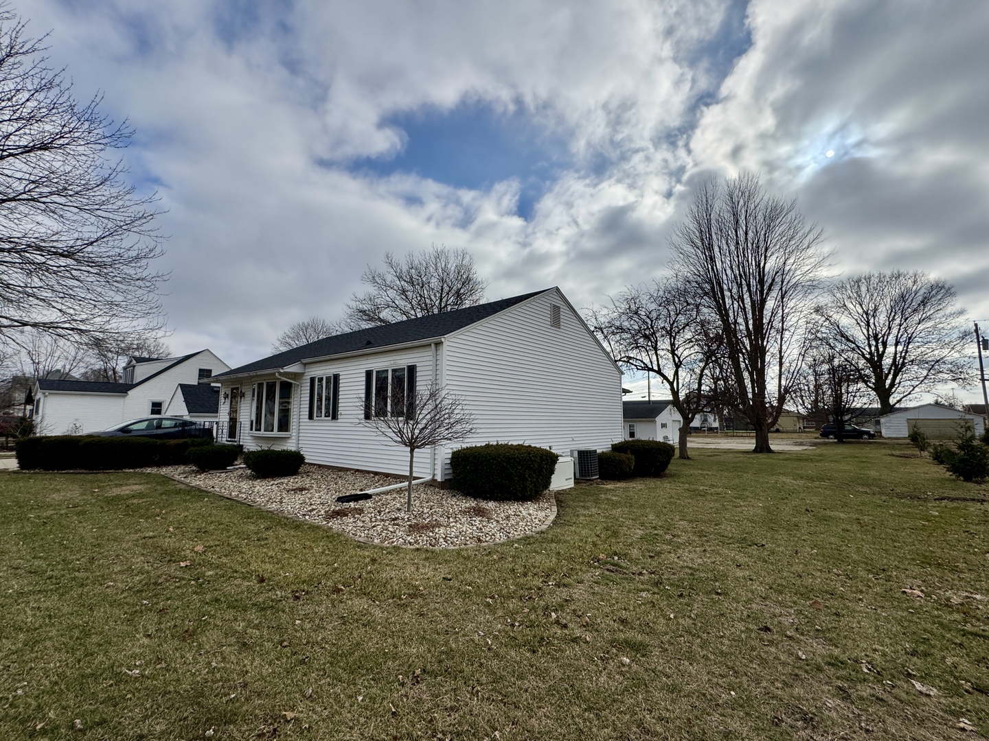 113 West 3rd Street Wyanet, IL 61379 - Photo 4 of 31 a view of a house with a yard