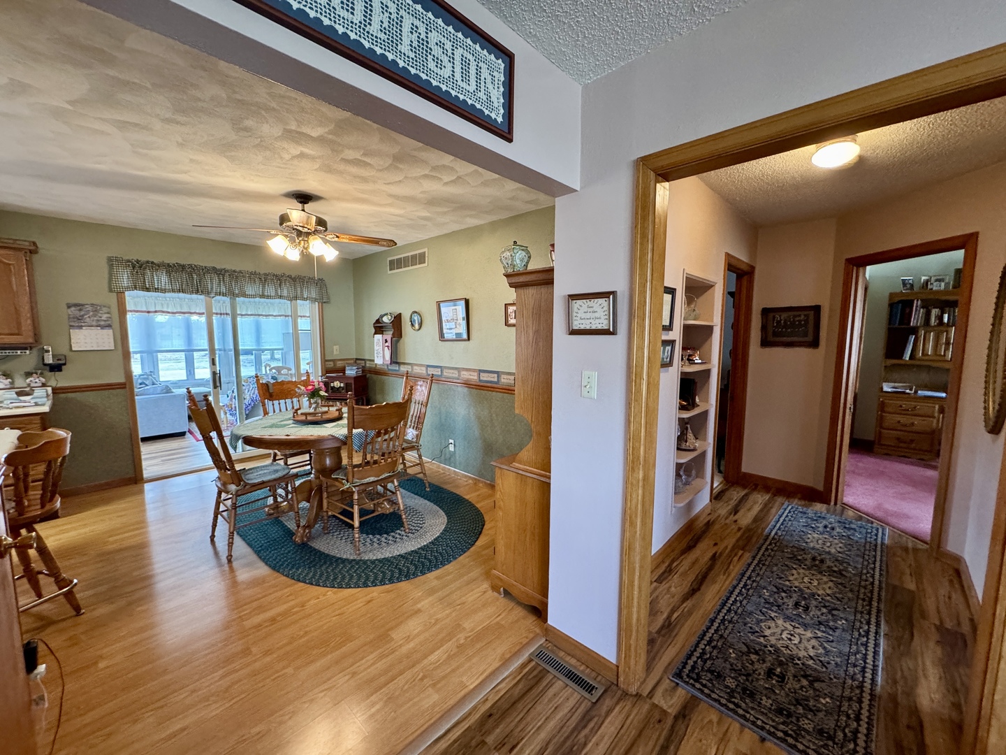 113 West 3rd Street Wyanet, IL 61379 - Photo 5 of 31 a living room with furniture and a table