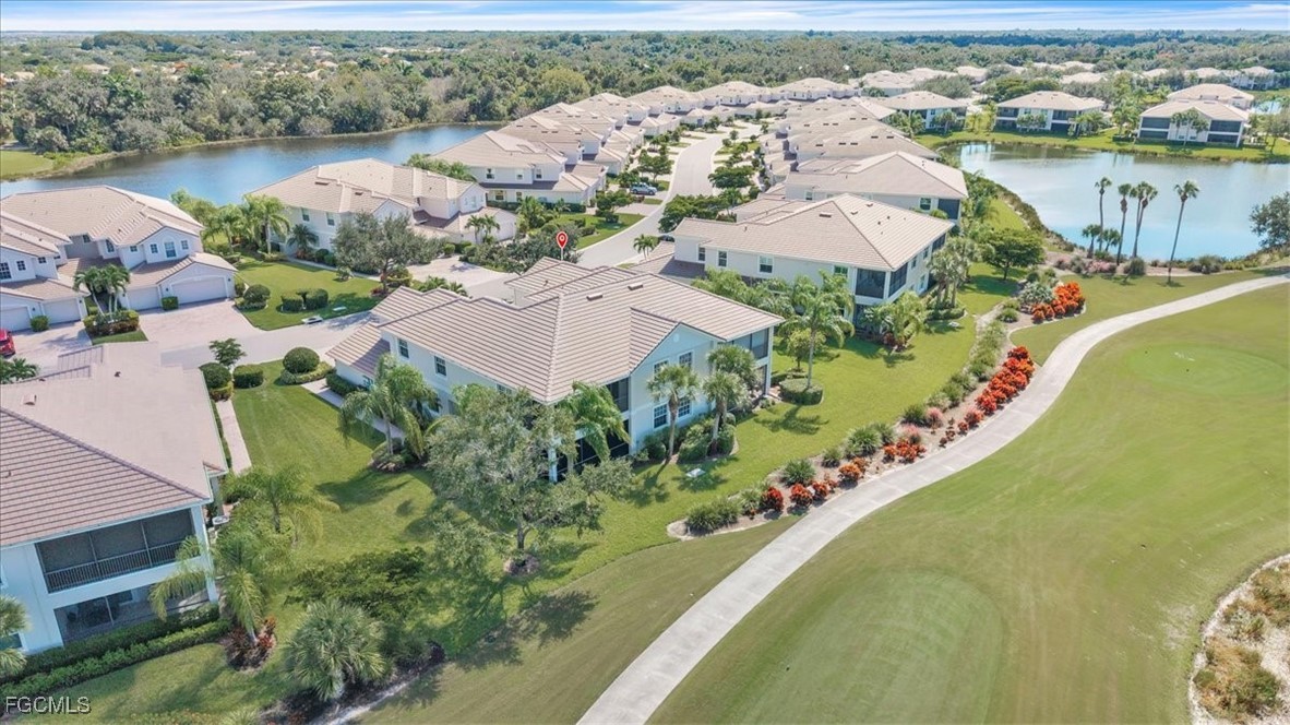3711 Pebblebrook Ridge Court, Unit 101 Fort Myers, FL 33905 - Photo 37 of 50 an aerial view of a house with a lake view