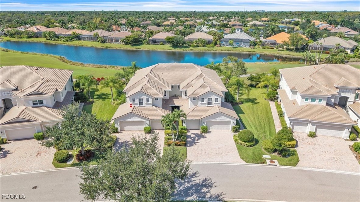 3711 Pebblebrook Ridge Court, Unit 101 Fort Myers, FL 33905 - Photo 39 of 50 an aerial view of a house with a lake view