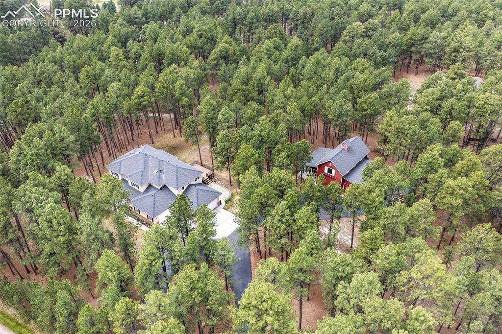 19010 Deerfield Road Monument, CO 80132 - Photo 49 of 50 an aerial view of a house with outdoor space and street view