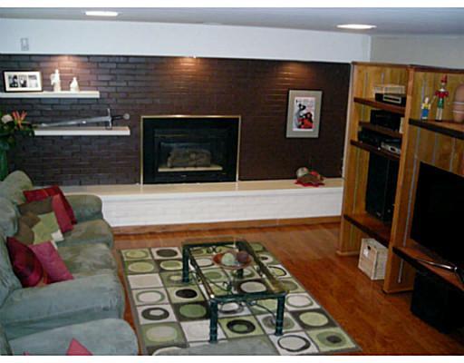 2277 Elmhill Road Churchill, PA 15221 - Photo 13 of 18 Den/Family/Great Room. Updated with hardwood flooring & Gas Fireplace...