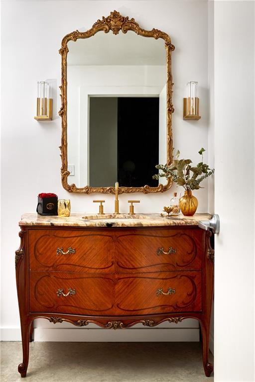 170 Boulevard Southeast, Unit 223E Atlanta, GA 30312 - Photo 17 of 75 a bathroom with a sink and a mirror