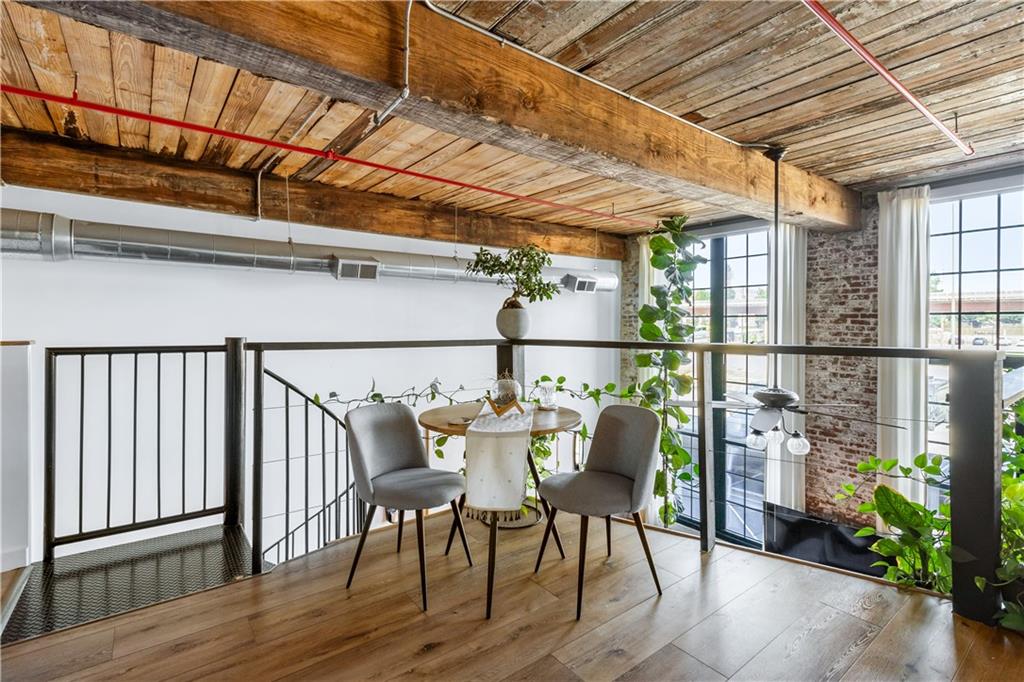 170 Boulevard Southeast, Unit 223E Atlanta, GA 30312 - Photo 37 of 75 a balcony with table and chairs