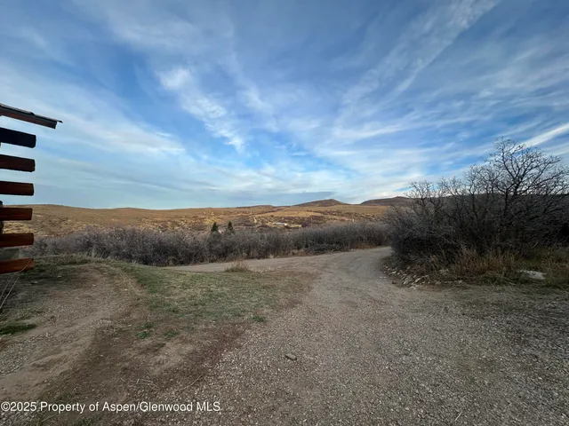a view of hotel room and wooden floor