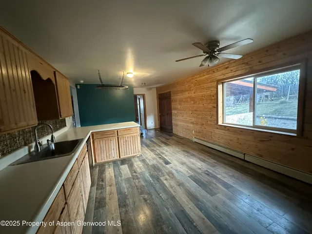 a view of empty room with windows