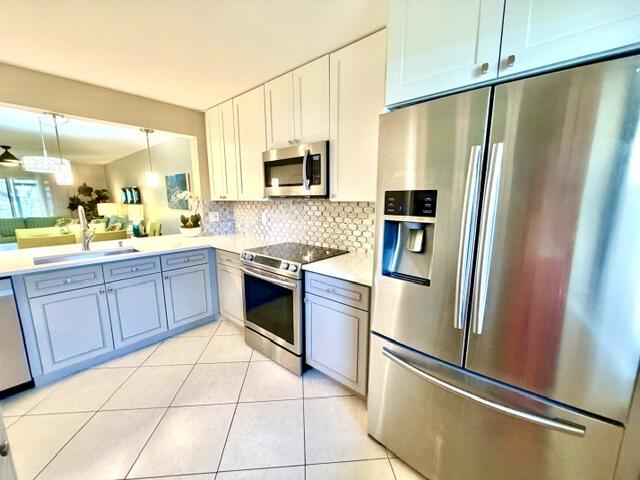 22148 Palms Way, Unit 101 Boca Raton, FL 33433 - Photo 9 of 41 Stainless appliances