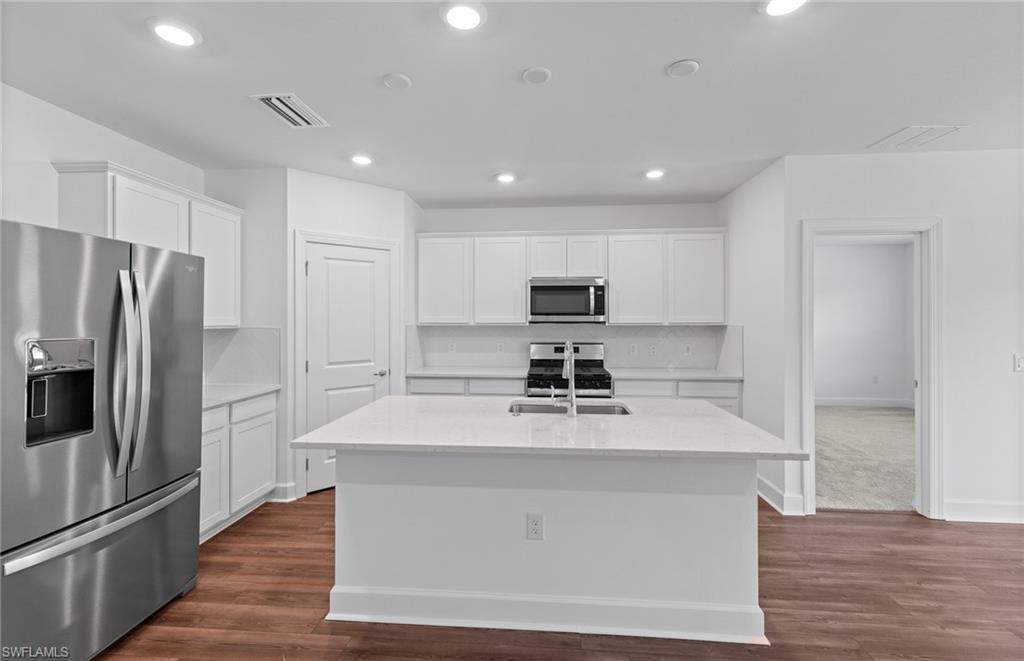 42343 Andes Loop Punta Gorda, FL 33982 - Photo 11 of 43 Kitchen island - Interior photos of home - Updated 8/7/24
