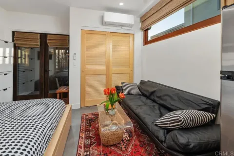 a view of a chairs and table in the patio