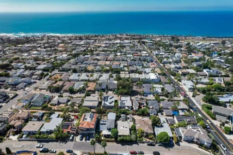 an aerial view of a city with lots of residential buildings