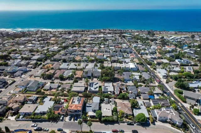 an aerial view of a city with lots of residential buildings