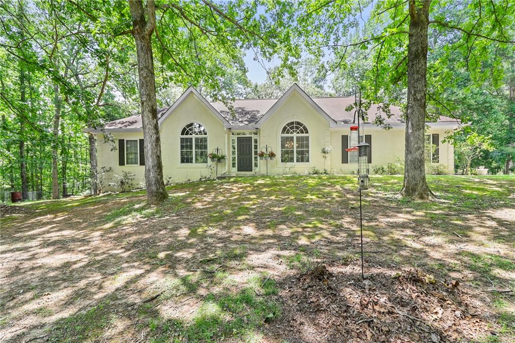10125 Creel Road Fairburn, GA 30213 - Photo 1 of 1 a front view of a house with a yard