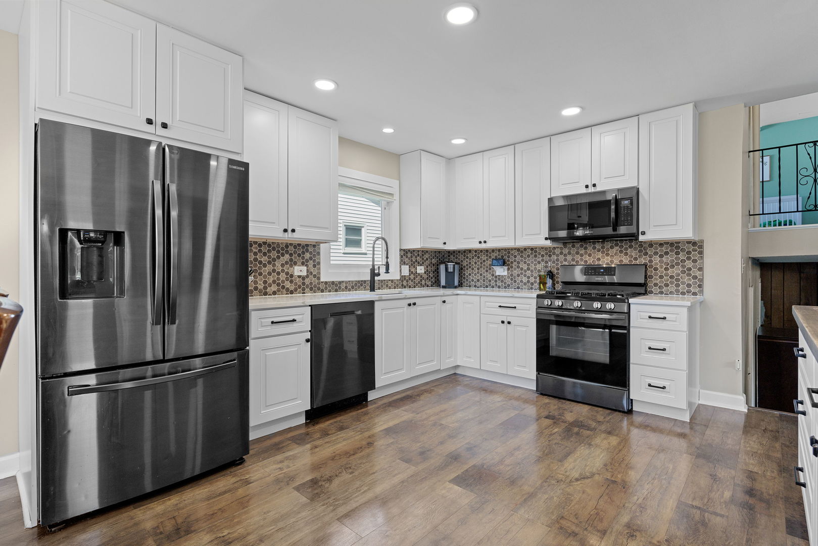 N151 Stanley Street Winfield, IL 60190 - Photo 13 of 27 a kitchen with a refrigerator stove and microwave