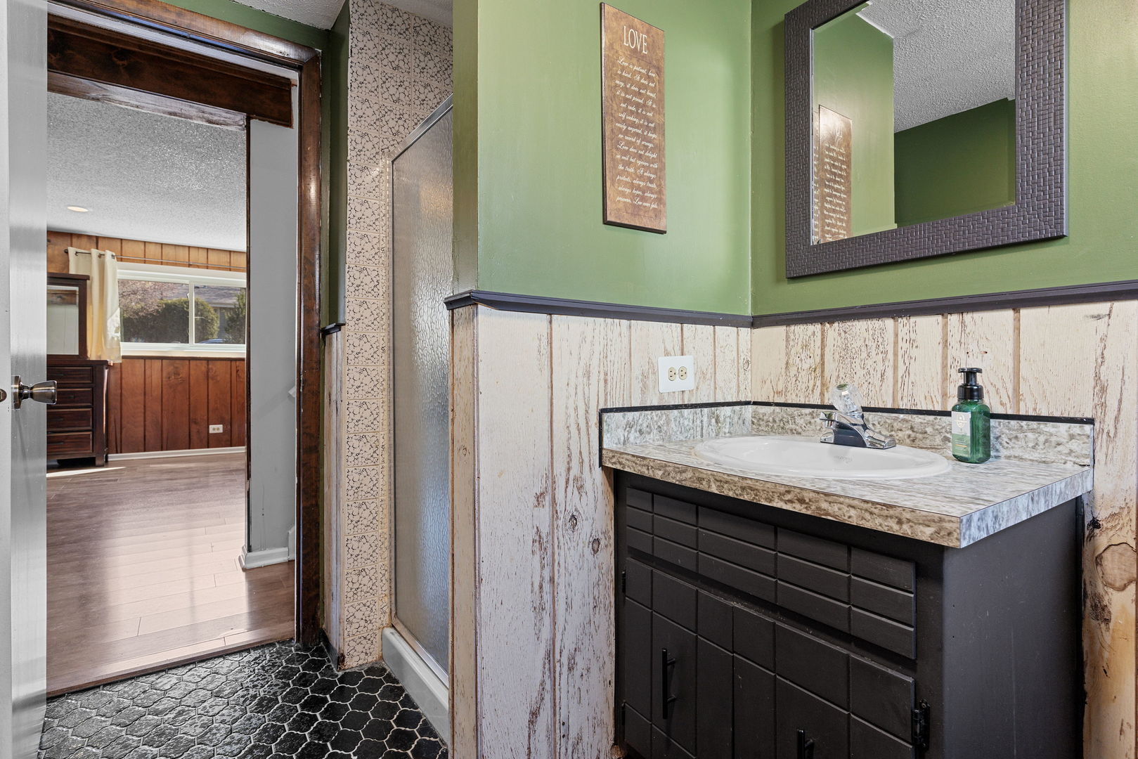 N151 Stanley Street Winfield, IL 60190 - Photo 19 of 27 a bathroom with a granite countertop sink and a mirror