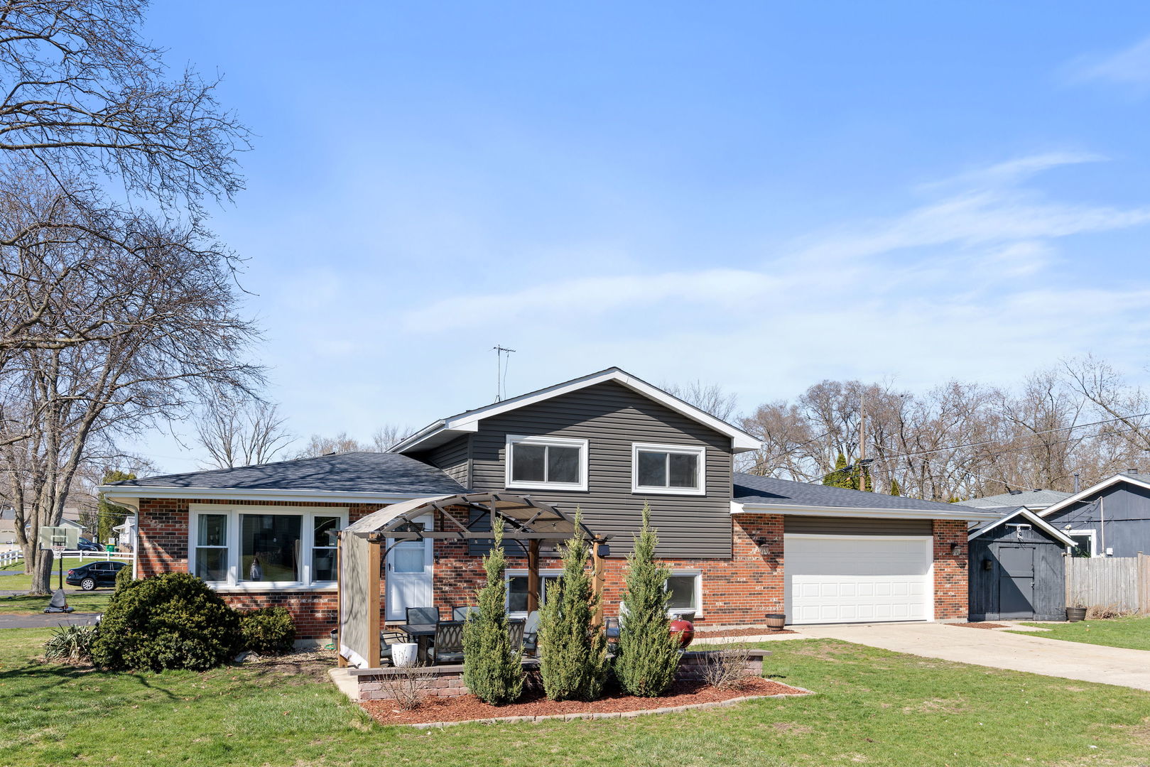 N151 Stanley Street Winfield, IL 60190 - Photo 2 of 27 a front view of a house with garden