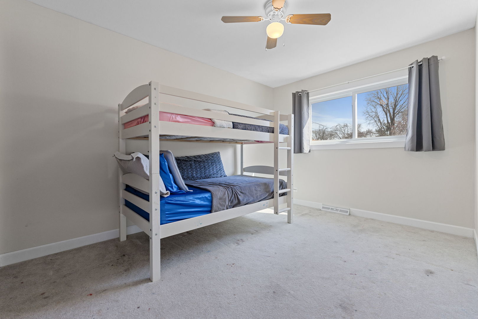 N151 Stanley Street Winfield, IL 60190 - Photo 22 of 27 a bedroom with a bed and a chandelier