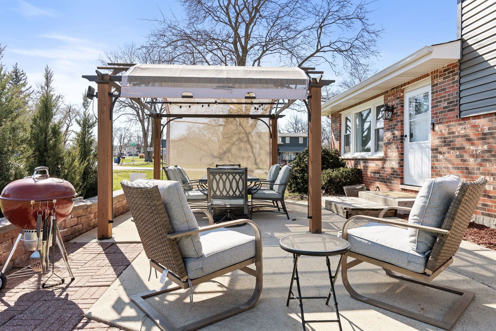 N151 Stanley Street Winfield, IL 60190 - Photo 24 of 27 a view of a patio with couches table and chairs