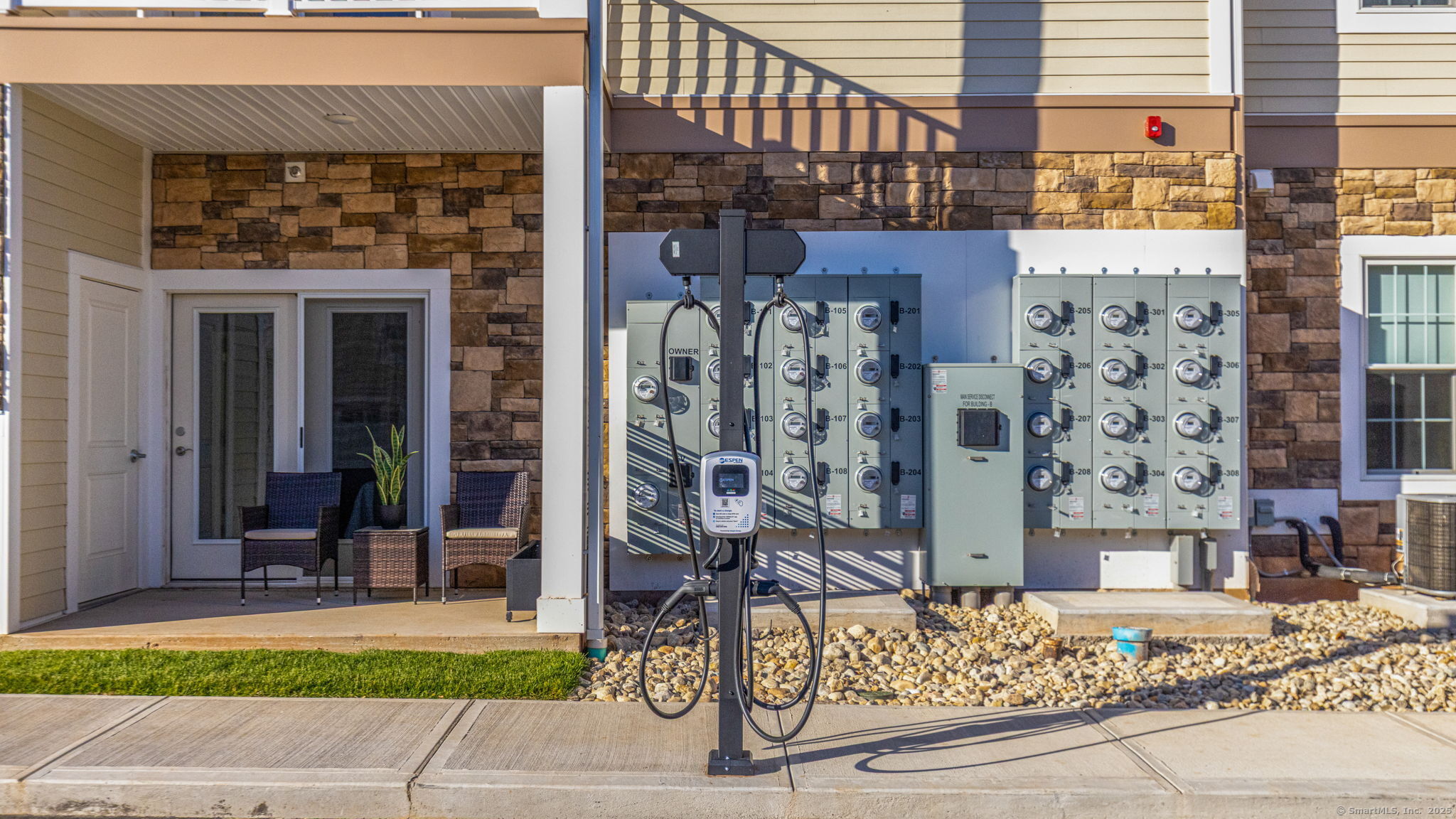 104 Episcopal Road, Unit 2 Berlin, CT 06037 - Photo 15 of 20 front view of a building with a street