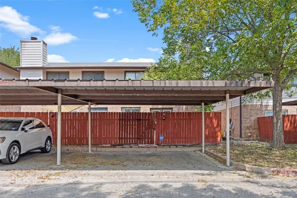 a car parked in front of a house