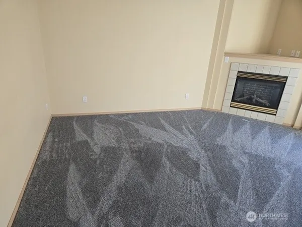 a view of a livingroom with a fireplace