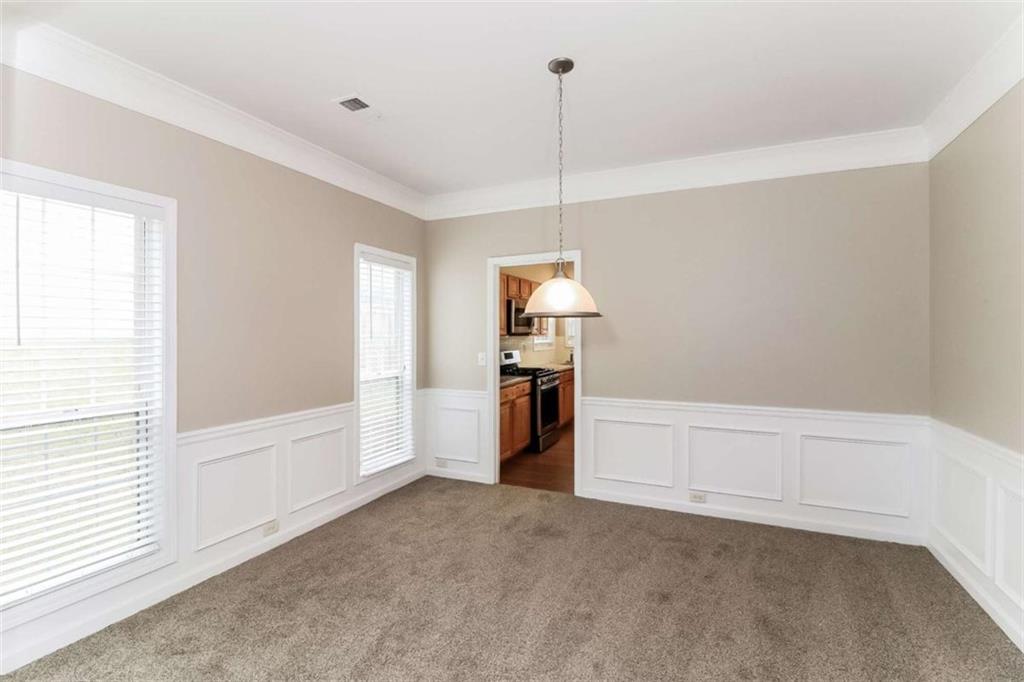 445 Fitzgerald Place Atlanta, GA 30349 - Photo 5 of 15 a view of a kitchen with a sink and dishwasher