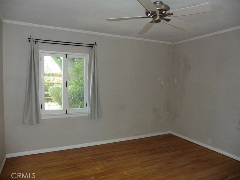 2658 San Marcos Drive Pasadena, CA 91107 - Photo 16 of 19 a view of an empty room with wooden floor and a window